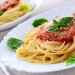 Pasta with tomato sauce basil and grated parmesan