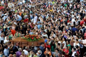 Italian bus plunges off viaduct, funeral mass